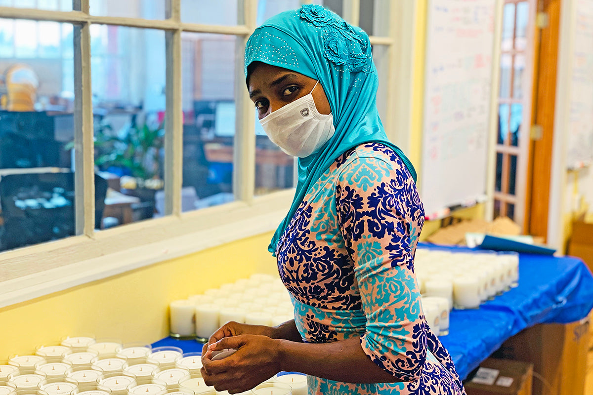 Nyota, Congolese candle-maker at Prosperity Candle, resettled to the U.S.