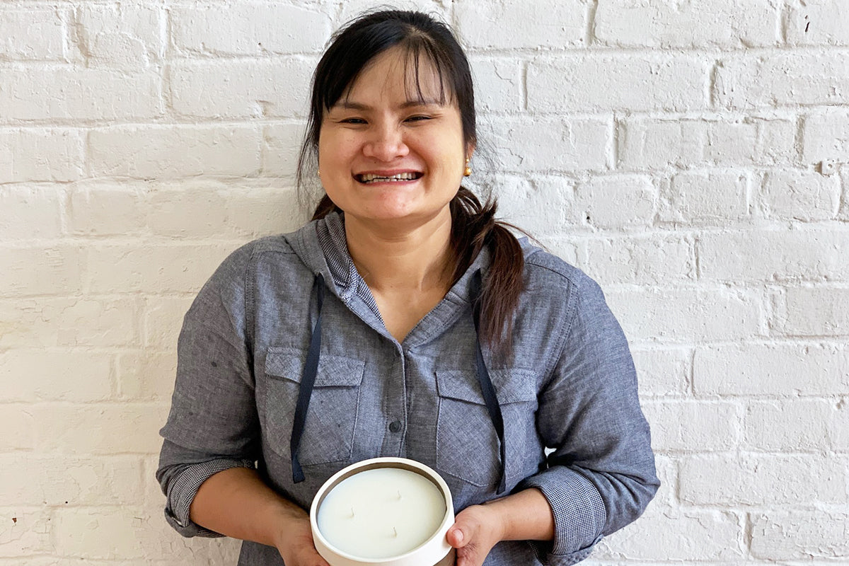 Tha joined Prosperity Candle as a candle-maker in 2015 after resettling to the U.S. from a refugee camp in Thailand in search of freedom and peace. 