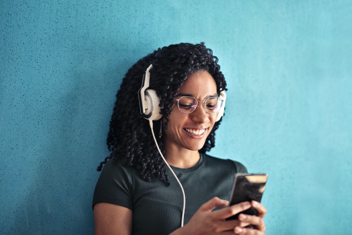 7 Conscious Living Podcasts to Expand Your Perspective on the World - Prosperity Candle Blog